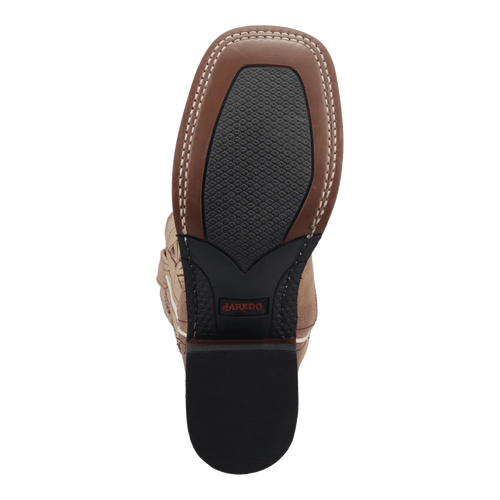 Laredo Women's Kite Days boot: Beige leather with embossed floral design, pointed toe, slightly elevated heel, and textured black rubber sole. Brown leather heel detail with stitching.
