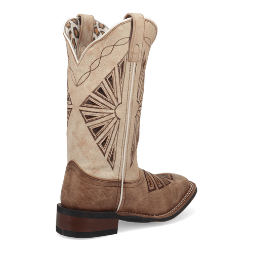 Laredo Women's Kite Days boot: Tall beige suede with brown stitching (sunbursts). Two-tone design with brown leather base. Rounded toe, stacked heel. Leopard print lining, pull tabs.
