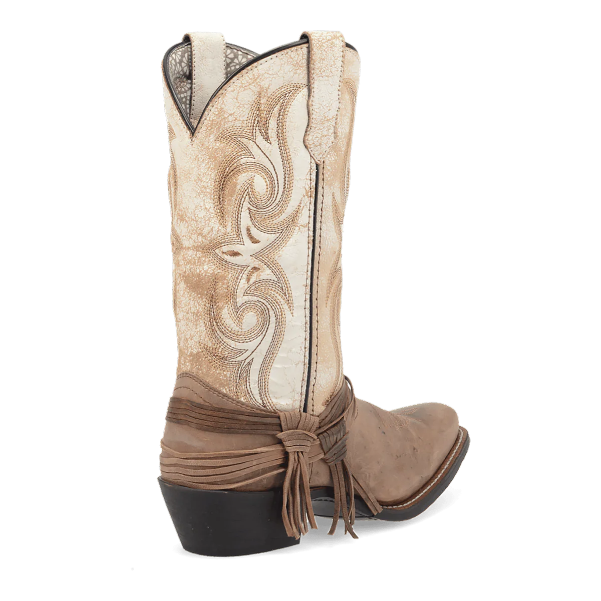 Laredo Myra women's boot: tall, pointed toe. Light beige upper with swirling stitch detail. Dark tan lower section. Ankle tie detail. Black sole.
