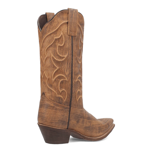 Laredo Reva women's boot: Tall brown boot with pointed toe and textured finish. Tonal stitching creates a swirl pattern. Chunky heel, pull tabs, and smooth lining.
