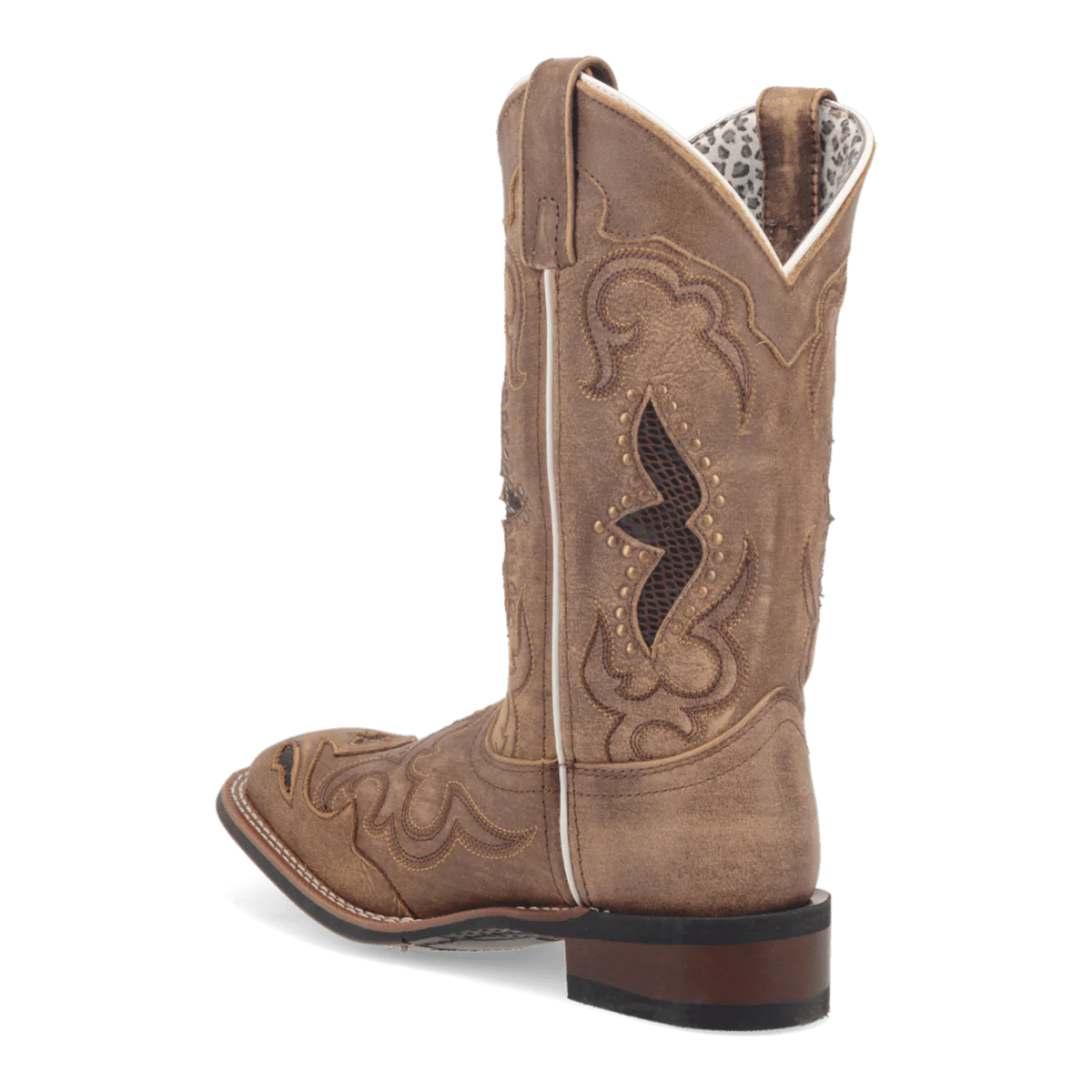 Laredo Women's Spellbound Boot: Tall, light brown suede-like boot with pointed toe and curved shaft. Features decorative stitching, dip at top, pull-on loop, and stacked heel.
