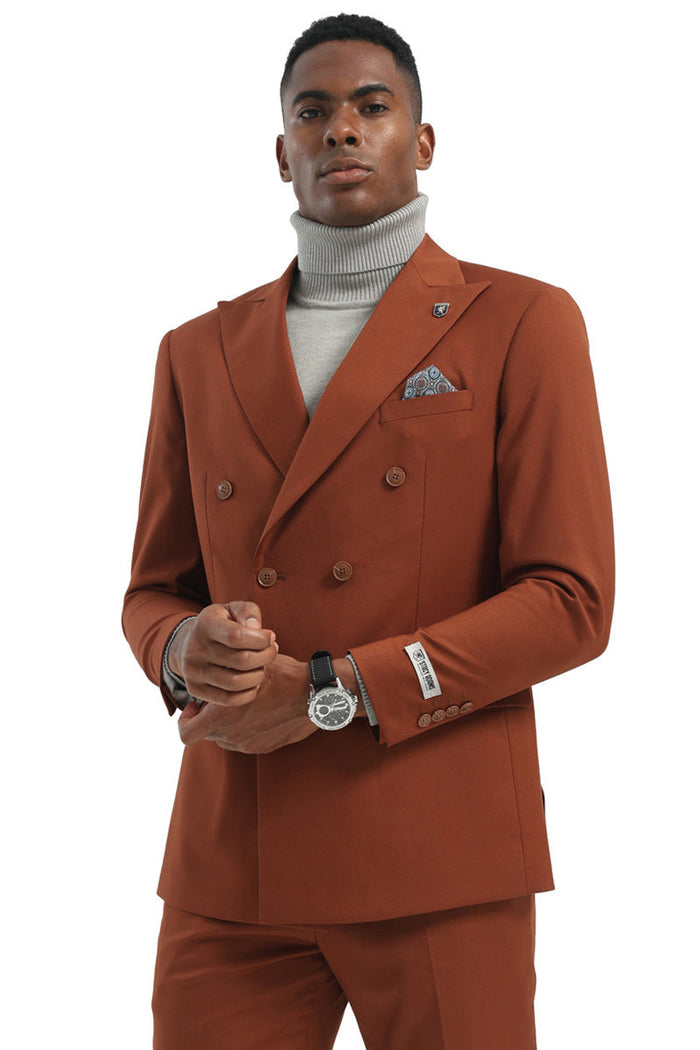 Cognac rust Stacy Adams double-breasted suit: structured blazer, slightly fitted, peak lapel, patterned pocket square. Matching trousers. Smooth fabric, two rows of buttons, buttoned cuffs.

