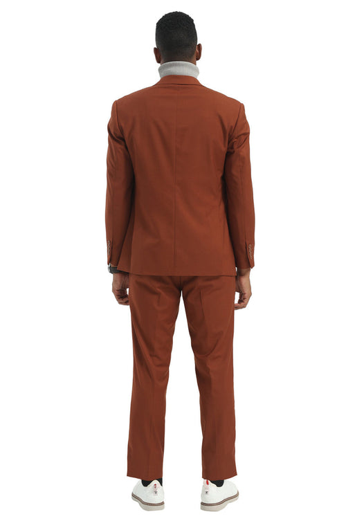 Stacy Adams classic double-breasted suit in cognac rust. Fitted jacket with structured silhouette, long sleeves, and standard lapels. Matching tailored trousers fall to the ankle. Smooth fabric and rich color.
