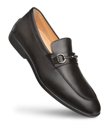 Classic black penny loafer. Smooth leather upper, rounded toe, and metal link strap detail. Tan interior offers a stylish contrast.
