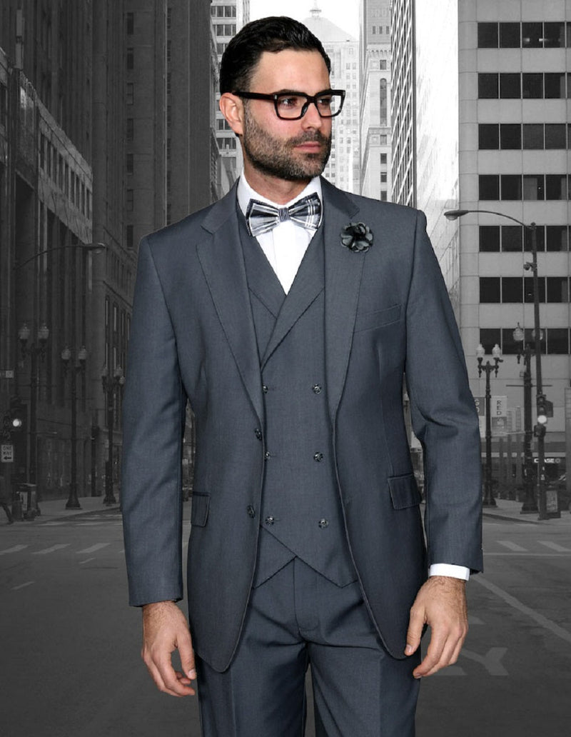 Charcoal grey men's suit: classic fit with pleated pants. Includes a 2-button blazer and double-breasted vest. Structured fit for a formal look.