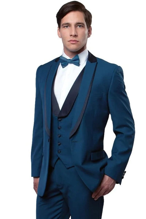 Teal blue men's tuxedo with one-button, satin trim, and peak lapel. Includes a matching vest with three-button closure. Fitted shape and smooth fabric for a formal look.
