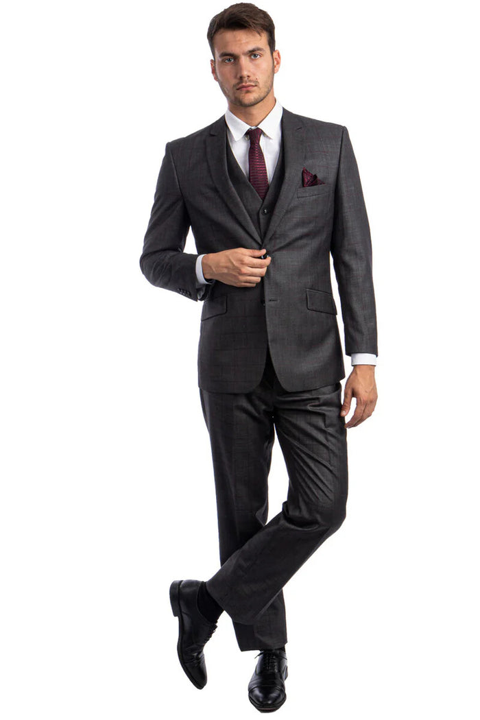 The men's 100% wool modern fit vested suit by Alberto Nardoni features a tailored jacket with a notched lapel, dual front pockets, and a three-button closure. The suit is charcoal gray with a subtle check pattern, complemented by matching trousers and a vested underlayer.