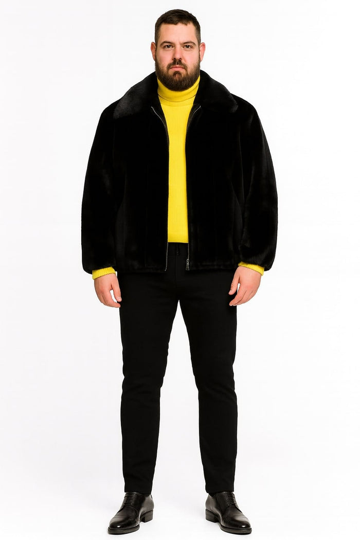Men's black faux fur jacket. Zip-up front, structured collar, and relaxed fit. Soft plush finish and long sleeves. Smooth surface.
