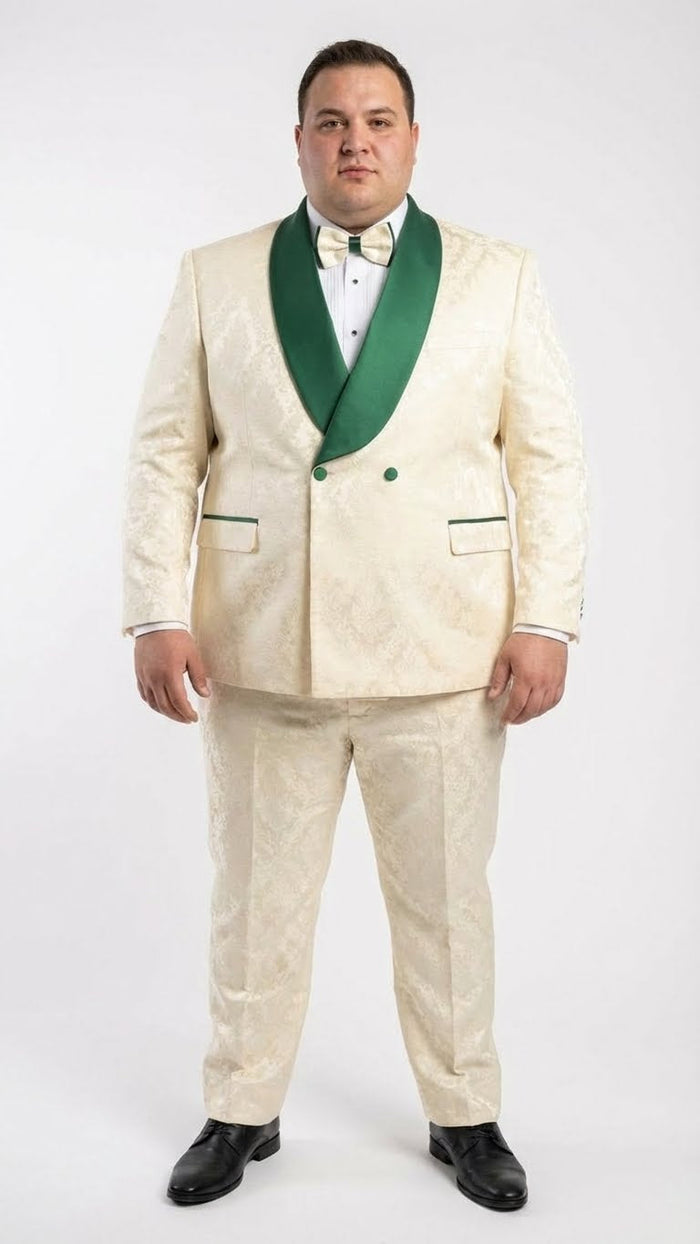 Ivory jacquard tuxedo with emerald green shawl lapels and matching double-breasted jacket. Features green piping and tailored trousers for a cohesive, patterned look.
