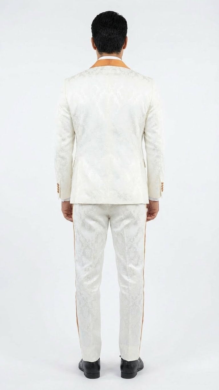 Ivory & gold jacquard tuxedo suit. Slim-fit, ivory base with gold jacquard patterns. Notched collar, single vent. Tapered pants with gold stripes. Glossy finish, luxurious texture.
