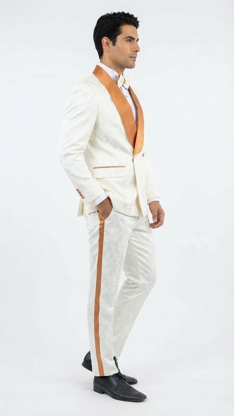Men's ivory tuxedo with gold jacquard pattern. Fitted single-breasted jacket with gold satin lapels. Ivory trousers feature a gold side stripe, creating a cohesive, elegant look.
