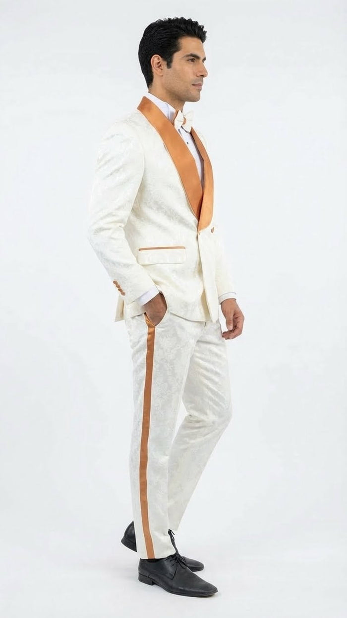 Men's ivory tuxedo with gold jacquard pattern. Fitted single-breasted jacket with gold satin lapels. Ivory trousers feature a gold side stripe, creating a cohesive, elegant look.
