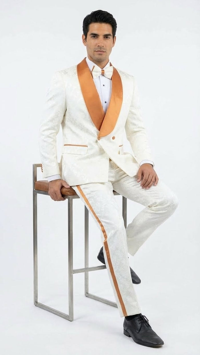 Ivory & gold jacquard tuxedo. Fitted jacket with gold notched lapel, subtle pattern, and pockets. Matching fitted trousers with gold side stripe. White shirt, bow tie. Luxurious, textured fabric. Formal.
