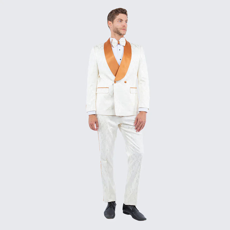 Men's ivory tuxedo with gold accents. Features textured jacquard fabric, gold satin shawl lapels, and matching tapered trousers. Elegant and refined.
