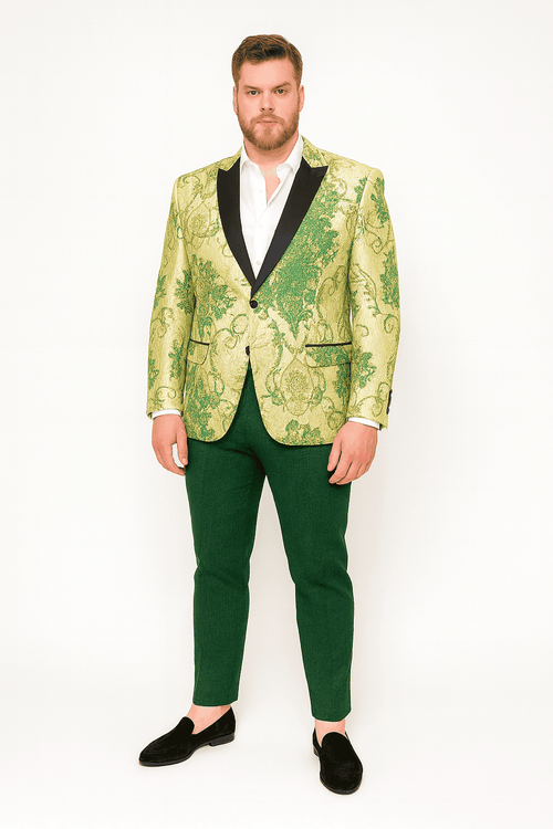 Ivory & green men's suit: floral embroidered tuxedo jacket (black satin lapel) & hunter green pants. Jacket features vibrant floral pattern & structured design.
