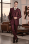 Men's burgundy three-piece suit: fitted, three-button blazer, matching vest, and pleated pants (classic/athletic cut). Solid burgundy fabric.
