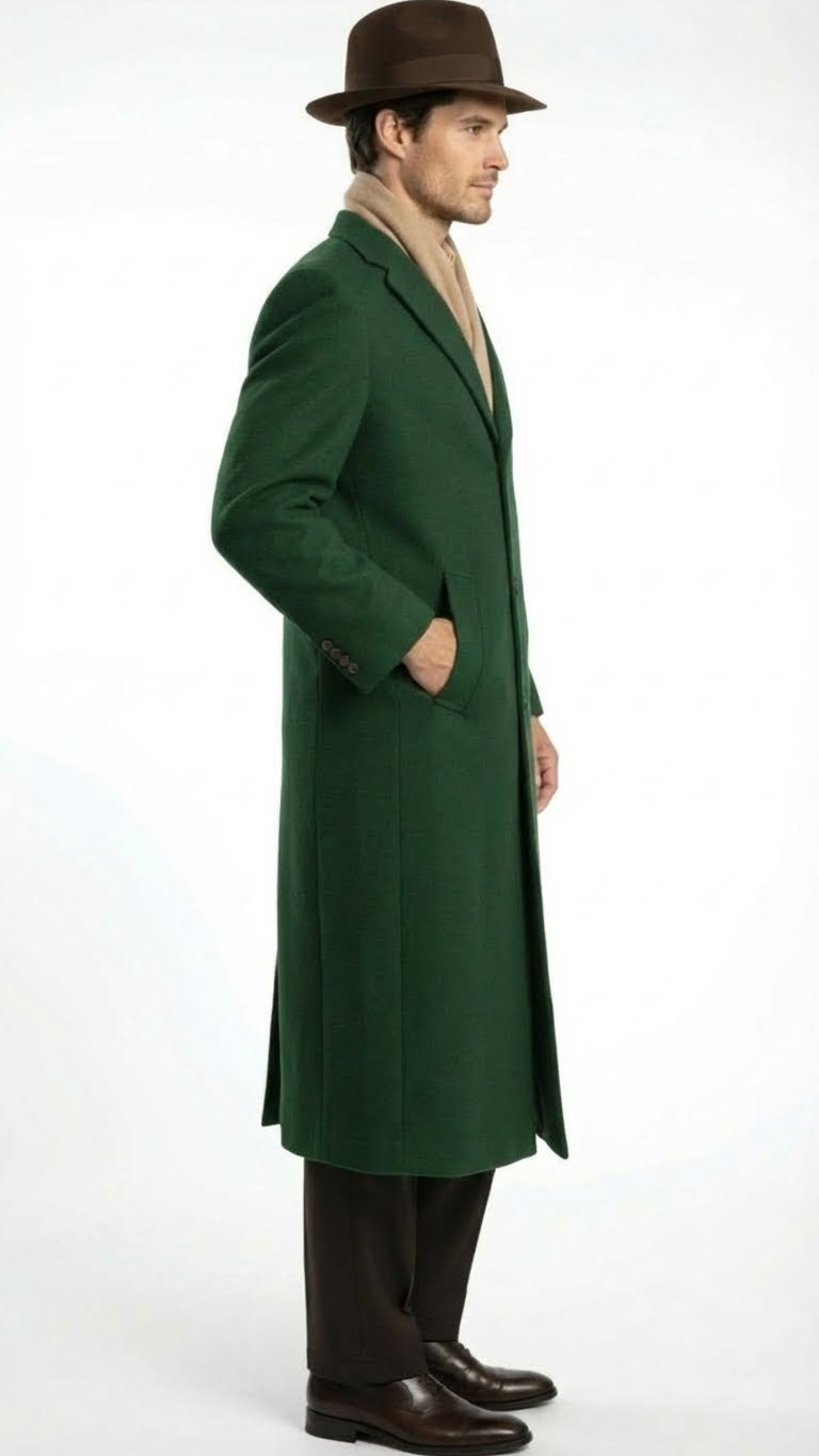 Alberto Nardoni men's hunter green wool overcoat. Full-length, straight cut, notched lapel. Thick, textured wool. Long sleeves with cuff buttons, side pockets. Tailored, formal silhouette. Beige scarf.
