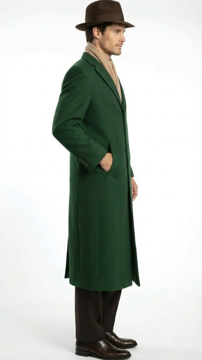 Alberto Nardoni men's hunter green wool overcoat. Full-length, straight cut, notched lapel. Thick, textured wool. Long sleeves with cuff buttons, side pockets. Tailored, formal silhouette. Beige scarf.
