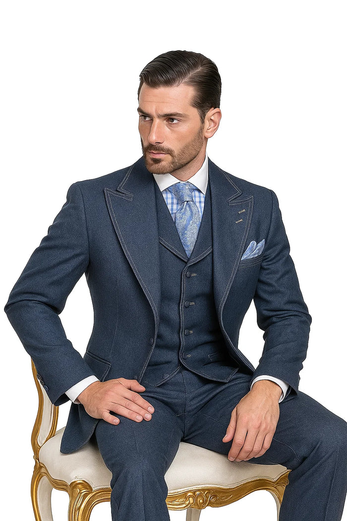 Vintage men's denim suit: Tailored blazer with lapels, vest, and slim pants. Dark denim, contrasting stitching, button accents. Includes checkered shirt, patterned tie, pocket square.

