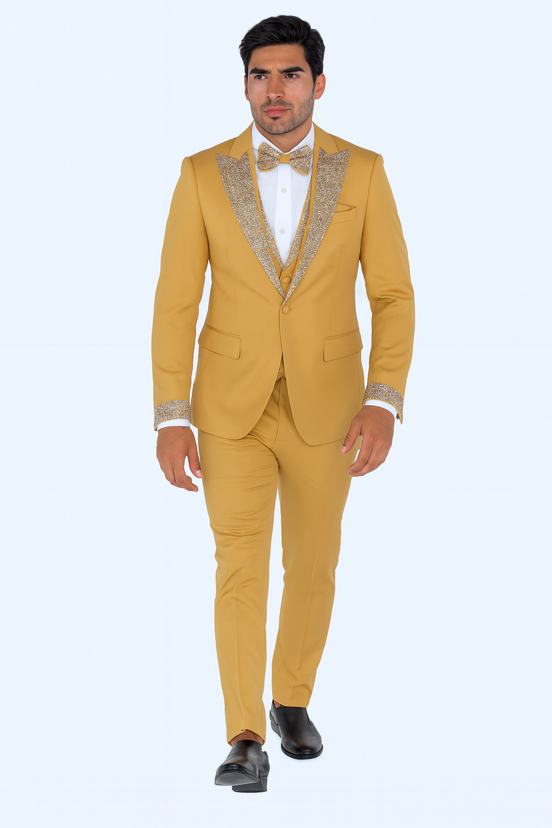 Champagne gold prom tuxedo: fitted, single-breasted jacket with embellished lapels. Matching trousers, vest, and bow tie. Smooth outer fabric with sparkling embellishments. Modern, tailored silhouette.
