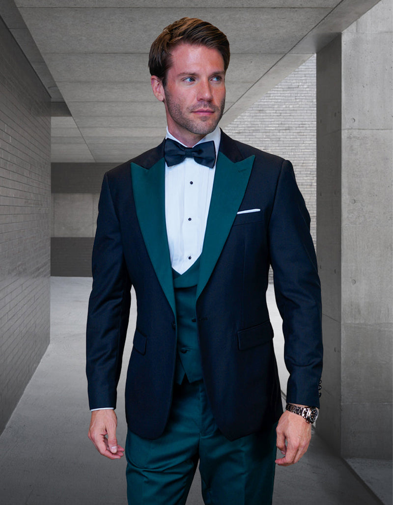 Men's formal tuxedo: black jacket w/ hunter green peak lapels & matching vest. Includes white shirt & black bow tie. Solid hunter green trousers. Perfect for weddings.
