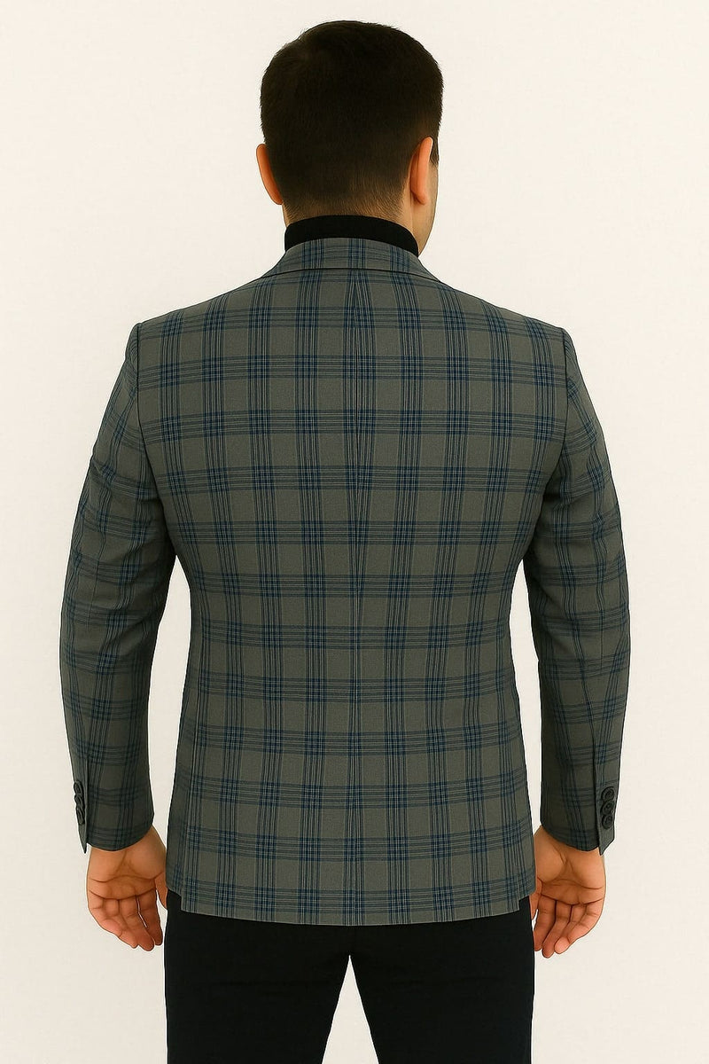 Blue & grey windowpane plaid men's blazer. Tailored fit, structured shoulders, notch lapel. Smooth woven fabric. Sleek back, fitted cut, button sleeves, and back vent.
