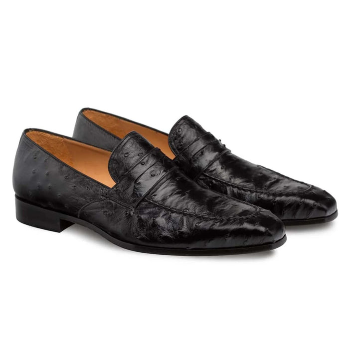 Mezlan Lisbon slip-on loafer for men in black ostrich leather. Pointed shape, low heel. Textured upper. Tan leather lining.
