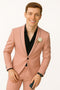 Men's slim fit pink tuxedo with black trim. Tailored design, pink satin finish, contrasting black lapels, and fitted silhouette. Includes matching pink trousers.
