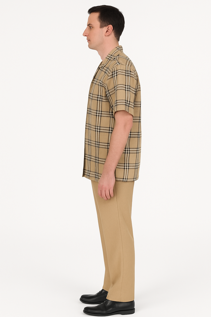 Men's beige plaid summer shirt. Short sleeves, relaxed fit. Beige and brown crisscross pattern, collar, lightweight fabric. Open front, comfortable for warm weather.
