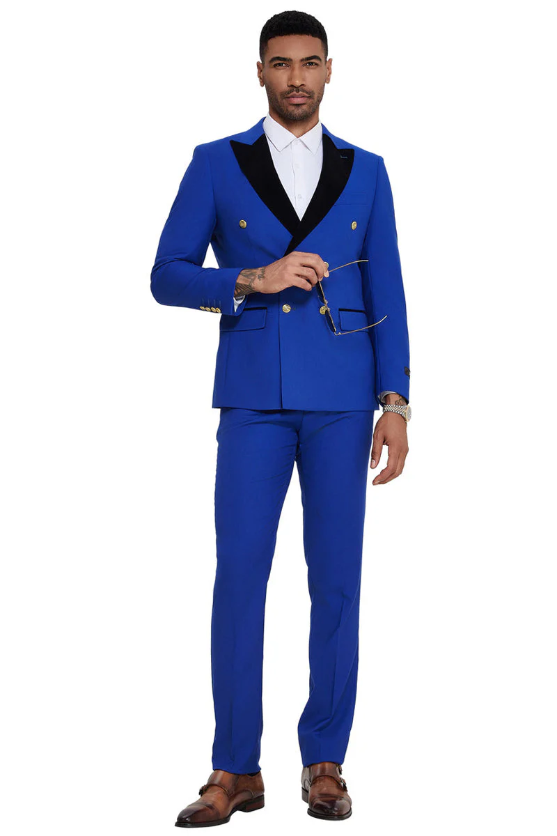 Men's double-breasted wedding suit in vibrant blue with a black velvet peak lapel. Tailored fit, gold buttons, and flat front trousers.
