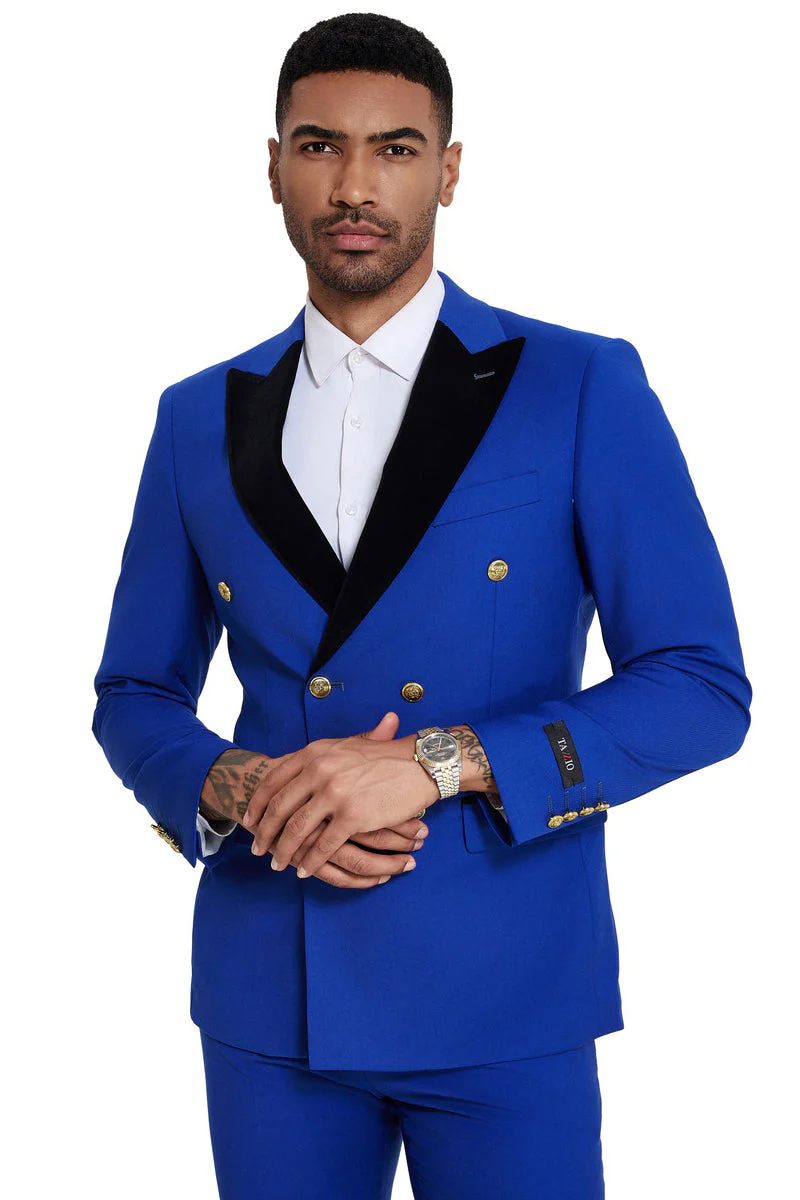 Men's double-breasted wedding suit in vibrant blue. Black velvet peak lapel, gold buttons, and a fitted silhouette.
