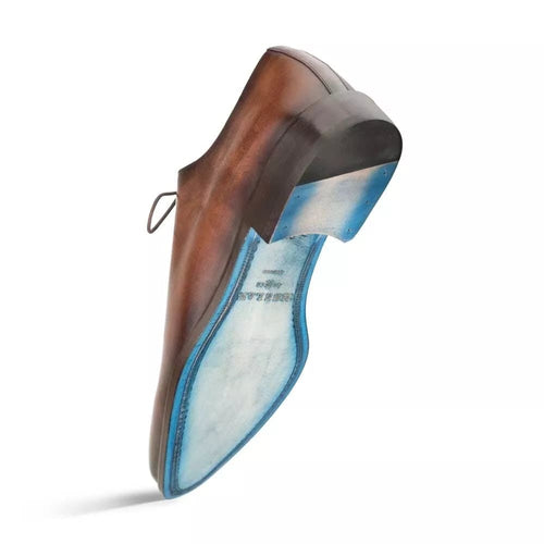 Mezlan Enterprise men's plain toe shoe in brown calfskin. Sleek, low-profile design with solid toe cap and slightly elevated heel. Features a contrasting blue interior and structured sole for durability. Decorative rear loop.
