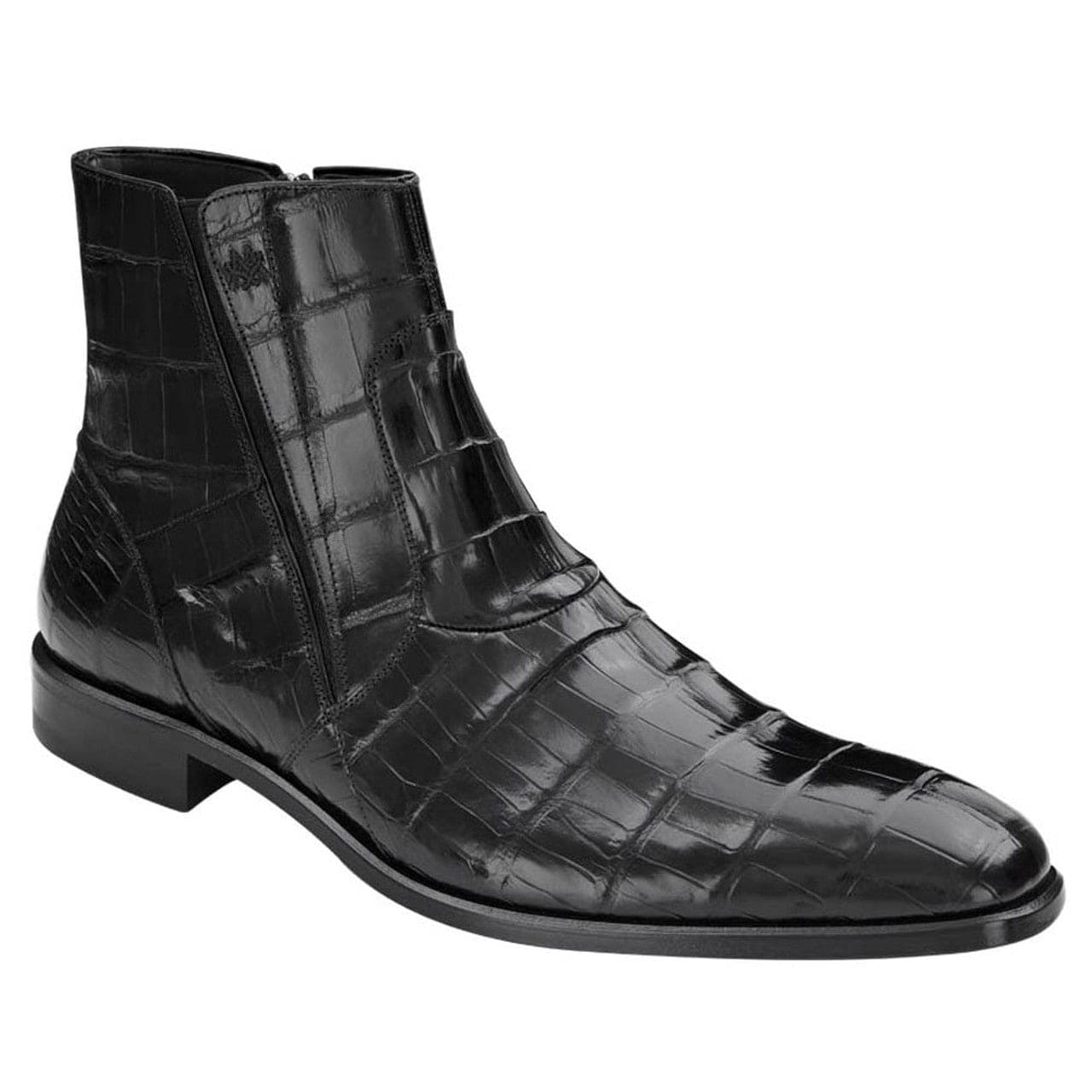 Black Mezlan Belucci alligator boots: ankle-high, pointed toe, side zip. Glossy black alligator leather upper with textured scales. Low heel, leather outsole, sophisticated design.
