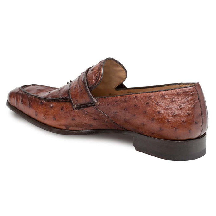 Mezlan Lisbon slip-on loafer in brandy ostrich leather. Textured pattern, round toe, low heel. Casual design with instep strap.
