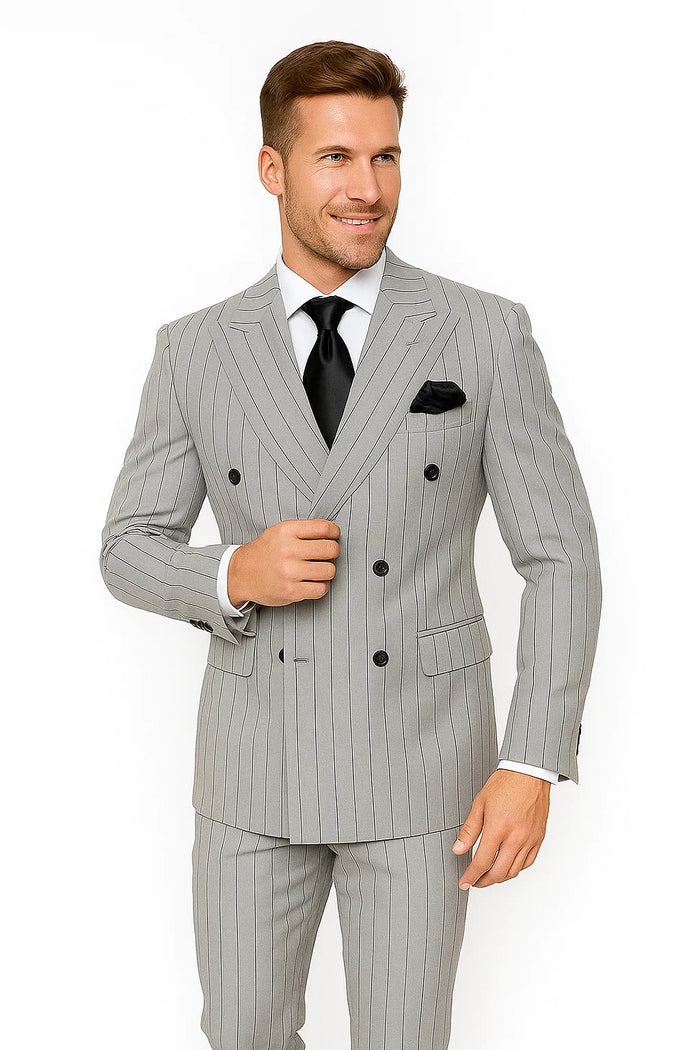 Gray/black pinstripe double-breasted suit. Modern fit, tailored silhouette, wide lapels, two front pockets. Smooth fabric.
