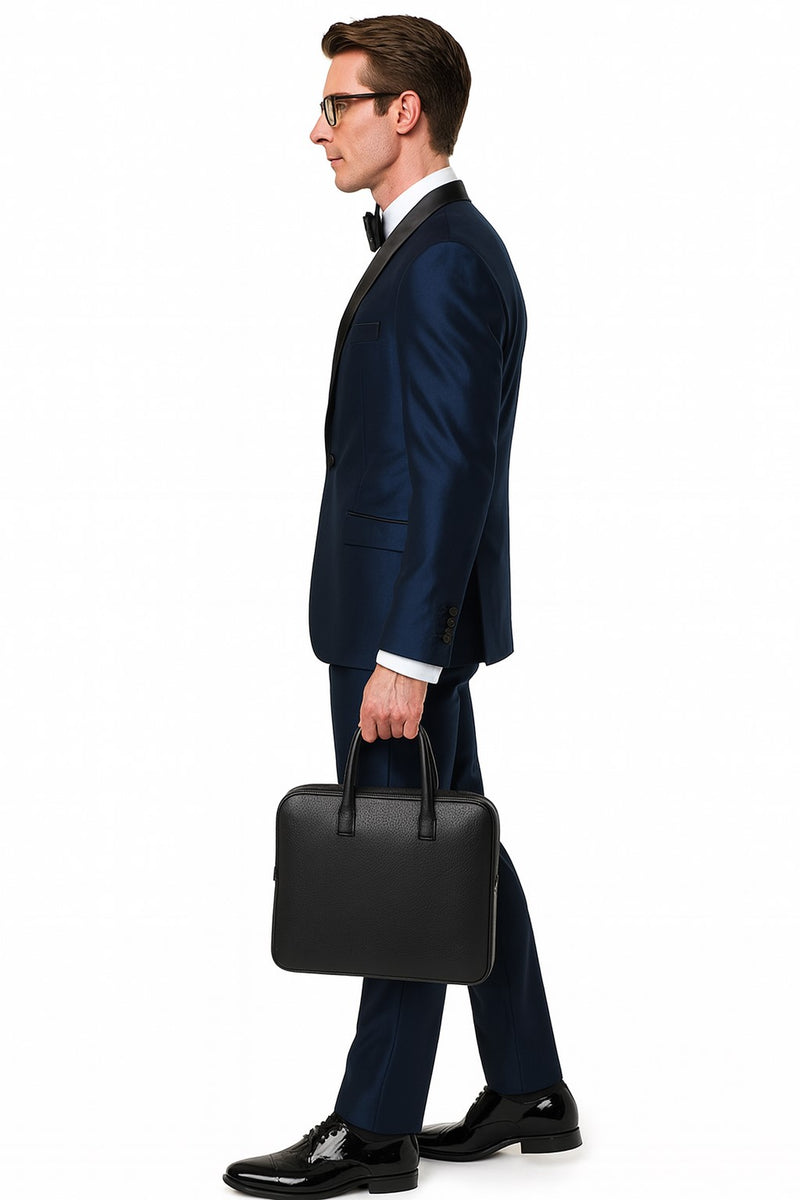 Men's light navy satin tuxedo with black shawl lapel. Three-piece design paired with a white dress shirt and black bow tie.
