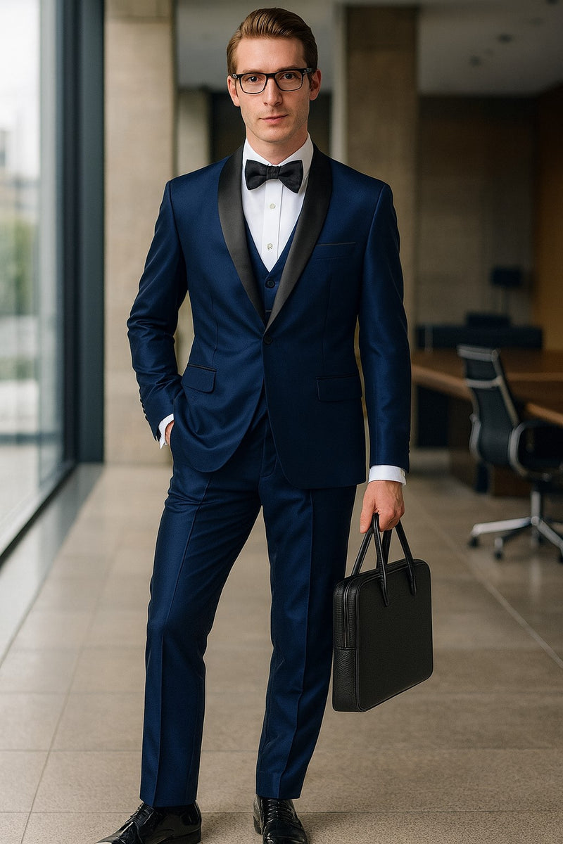 Navy satin tuxedo for men with black shawl lapel. Three-piece design includes a matching waistcoat. Elegant and sophisticated look.
