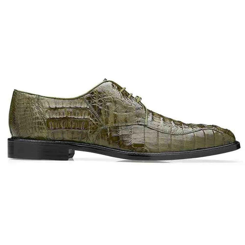 Olive green Belvedere Chapo Oxfords crafted from exotic crocodile hornback leather. Sleek, elongated shape with a pointed toe. Textured, scaled upper, transitioning to a raised heel and flat black sole.
