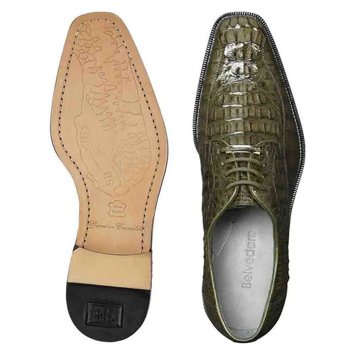 Green crocodile hornback Oxfords by Belvedere. Glossy finish, pointed toe, lace-up. Two-toned sole: leather & black rubber heel. Leather lining with branded insole.
