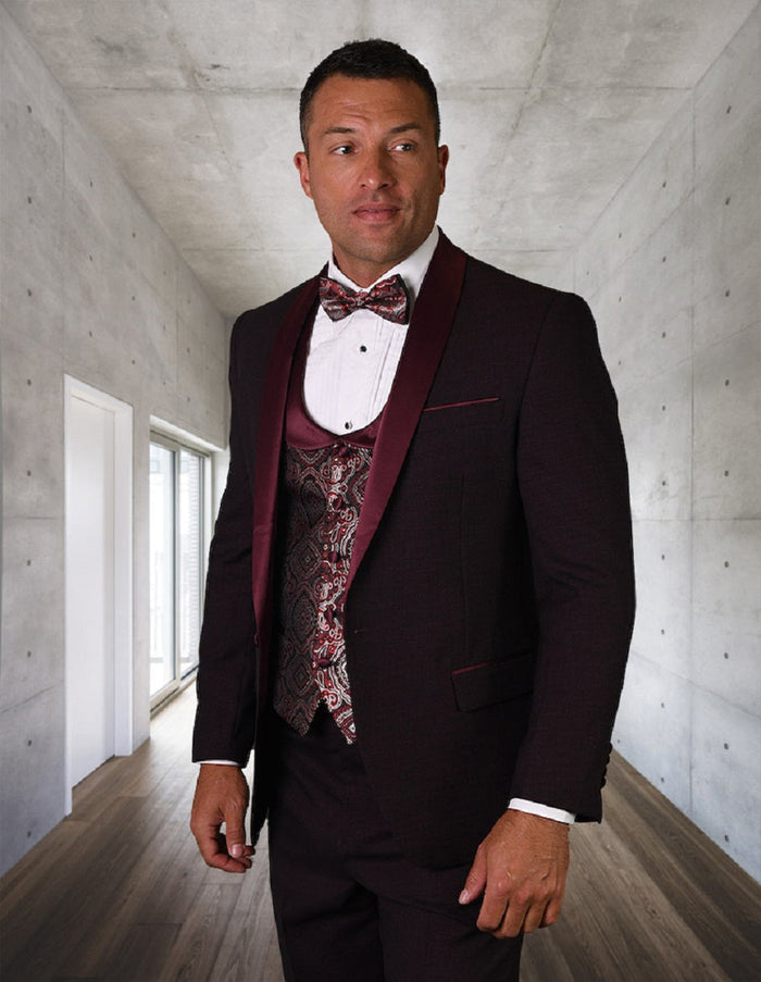Burgundy one-button shawl tuxedo with matching shawl collar. Includes paisley burgundy vest, white dress shirt, and bow tie.
