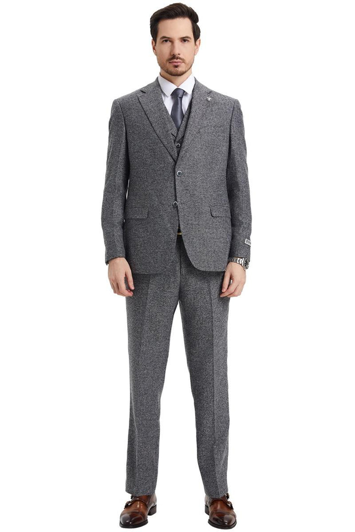 Men's Stacy Adams grey herringbone tweed suit. Vintage style with a two-button blazer, notched lapels, vest, and matching trousers. Classic herringbone pattern and medium grey color.
