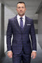 Modern fit men's Italian wool suit in heather charcoal plaid. Tailored silhouette, structured shoulders, single-button closure. Features subtle charcoal/dark blue plaid, notch lapel, chest pocket, and straight-leg trousers.
