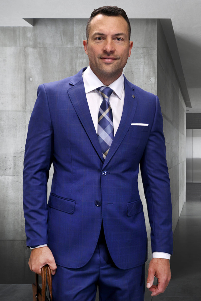 Men's modern fit Italian wool suit. Indigo blue plaid. Two-button blazer with notched lapels and flap pockets. Matching trousers. Designer quality.
