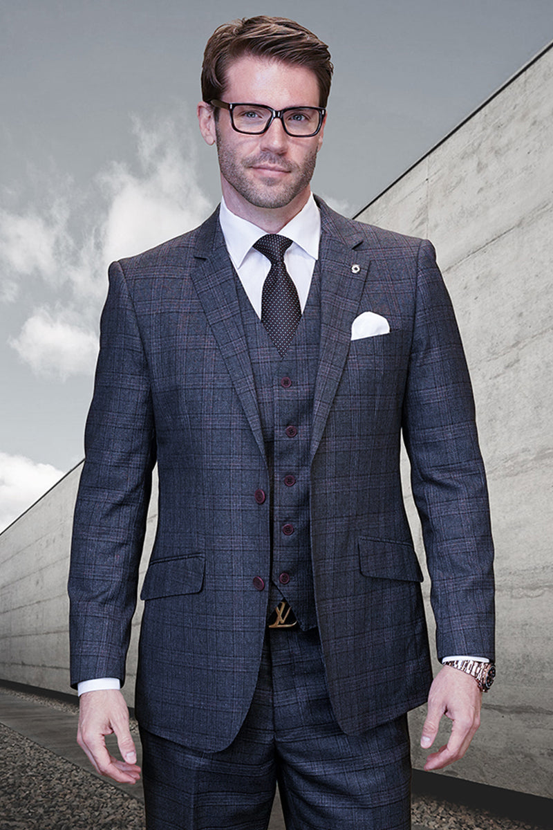 Men's charcoal grey plaid, two-button wool suit. Tailored fit, notch lapels, three-piece design. Subtle dark grey plaid pattern. Fully lined. Vest with six-button closure.
