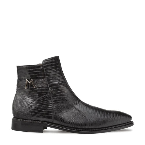 Mezlan's Giovane derby: Black genuine crocodile. Pointed cap toe, high-cut design. Textured leather with metallic detail. Solid black sole. Stylish and luxurious.
