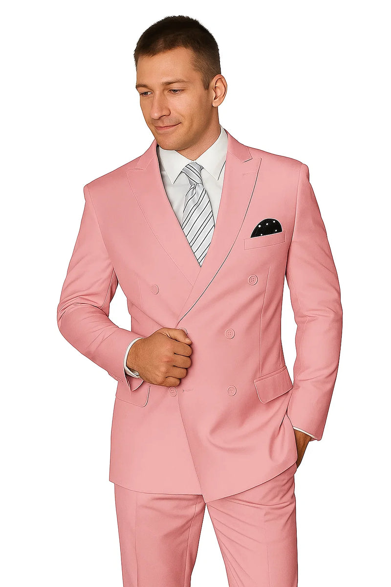 Blush pink men's double-breasted wool suit. Tailored jacket: wide lapels, double-row buttons, chest pocket with handkerchief. Slim-fit trousers complete the elegant ensemble.
