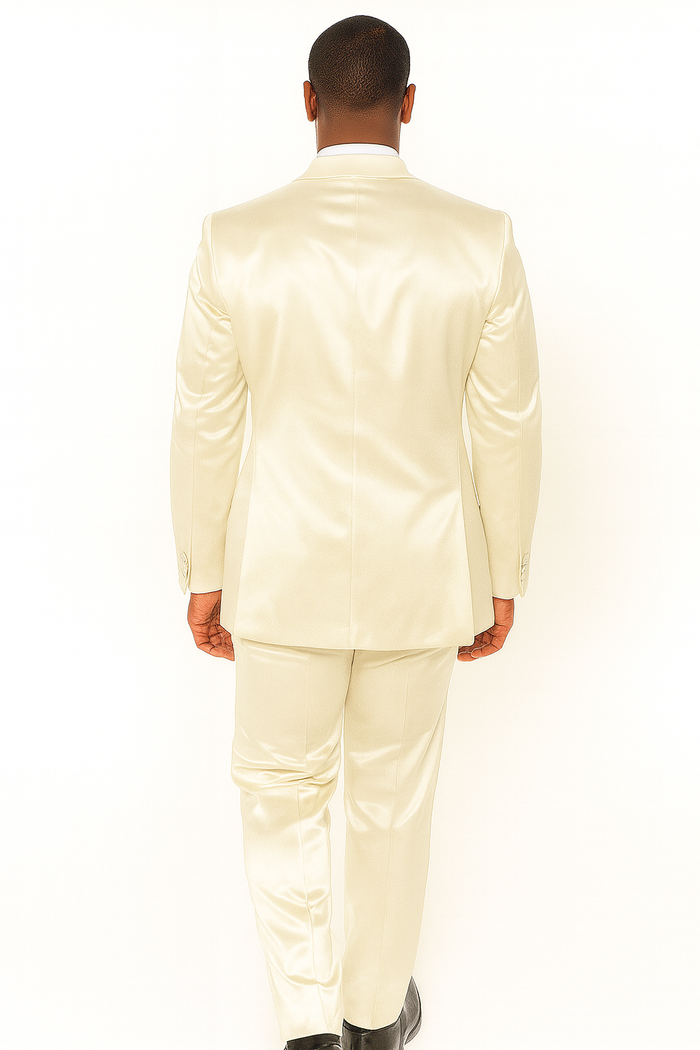 Men's formal tuxedo set in champagne satin. Jacket: tailored fit, single back vent. Trousers: straight leg, matching satin finish. Smooth, shiny texture.
