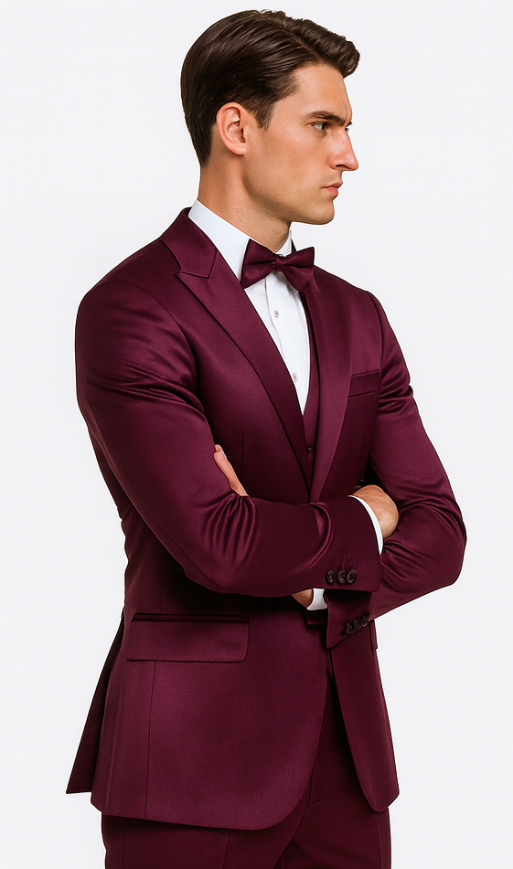 Men's purple satin Tazzio 3-piece suit. Double-breasted with peak lapel, tailored fit, slim trousers. Smooth, shiny texture and rich plum color. Structured shoulders.