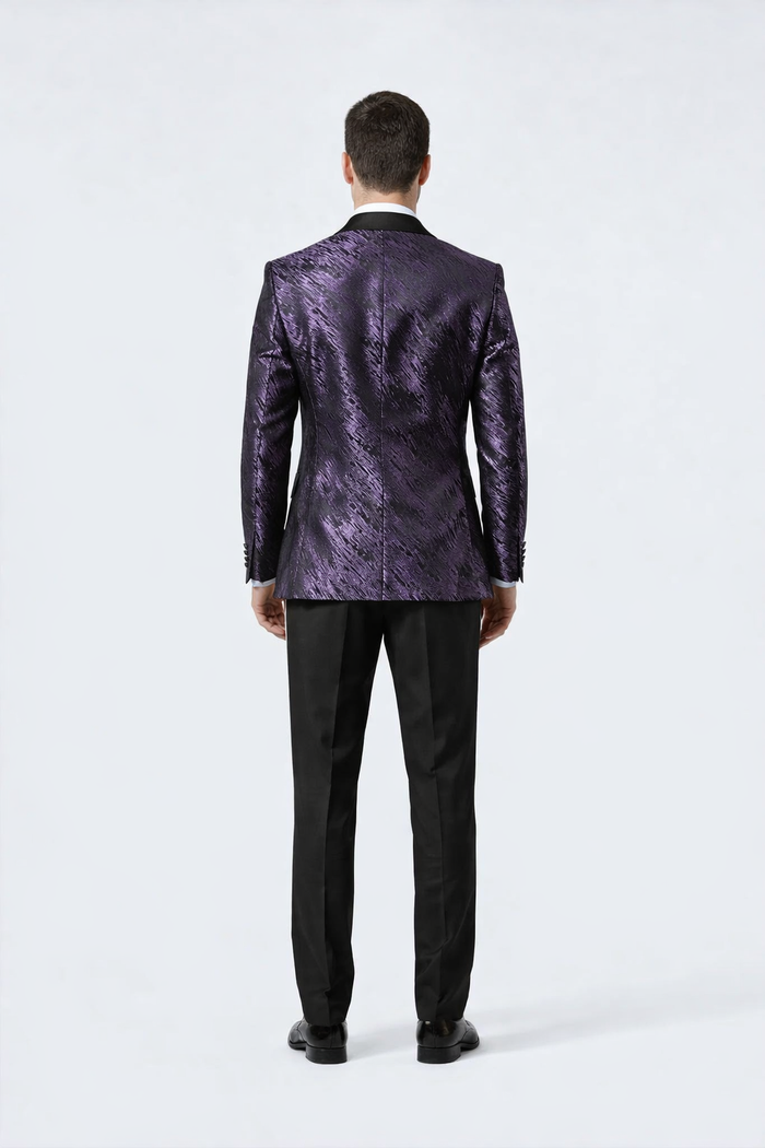 Men's formal purple jacquard tuxedo jacket. Black satin peak lapel, textured pattern. Fitted silhouette, single back vents, structured shoulders. Perfect for formal events.
