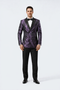 Men's purple jacquard tuxedo jacket. Black satin peak lapel, double-breasted, textured pattern. Structured shoulders, fitted sleeves. Formal elegance.
